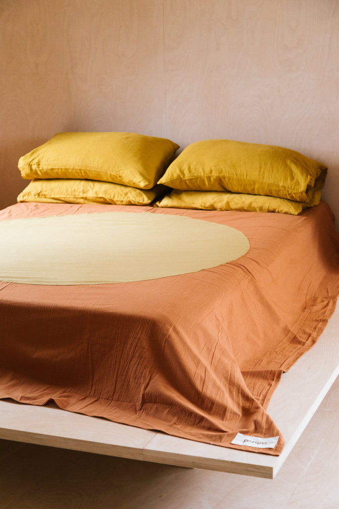 Sol Bed Throw | Rust & Mustard